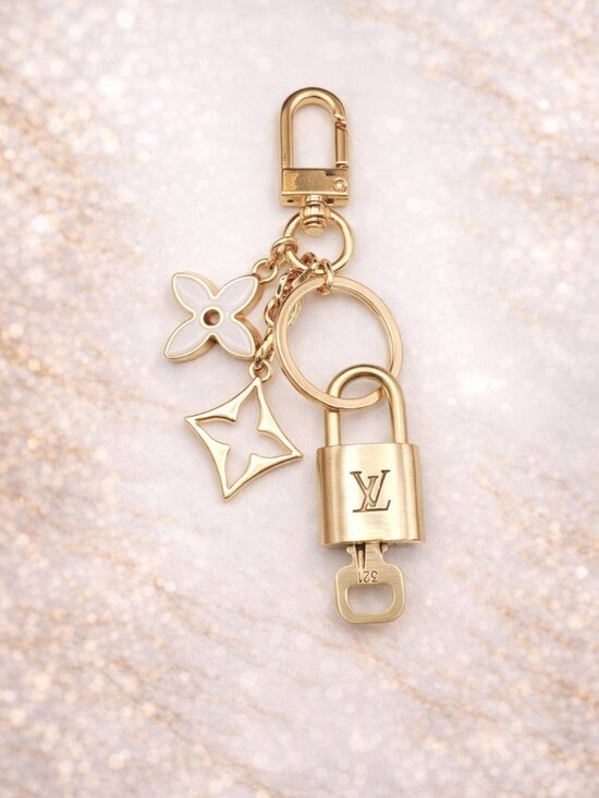 Louis Vuitton Accessories - Authentic Louis Vuitton Gold Lock 🔒 Unbranded Flower Keychain Bag Charm LV